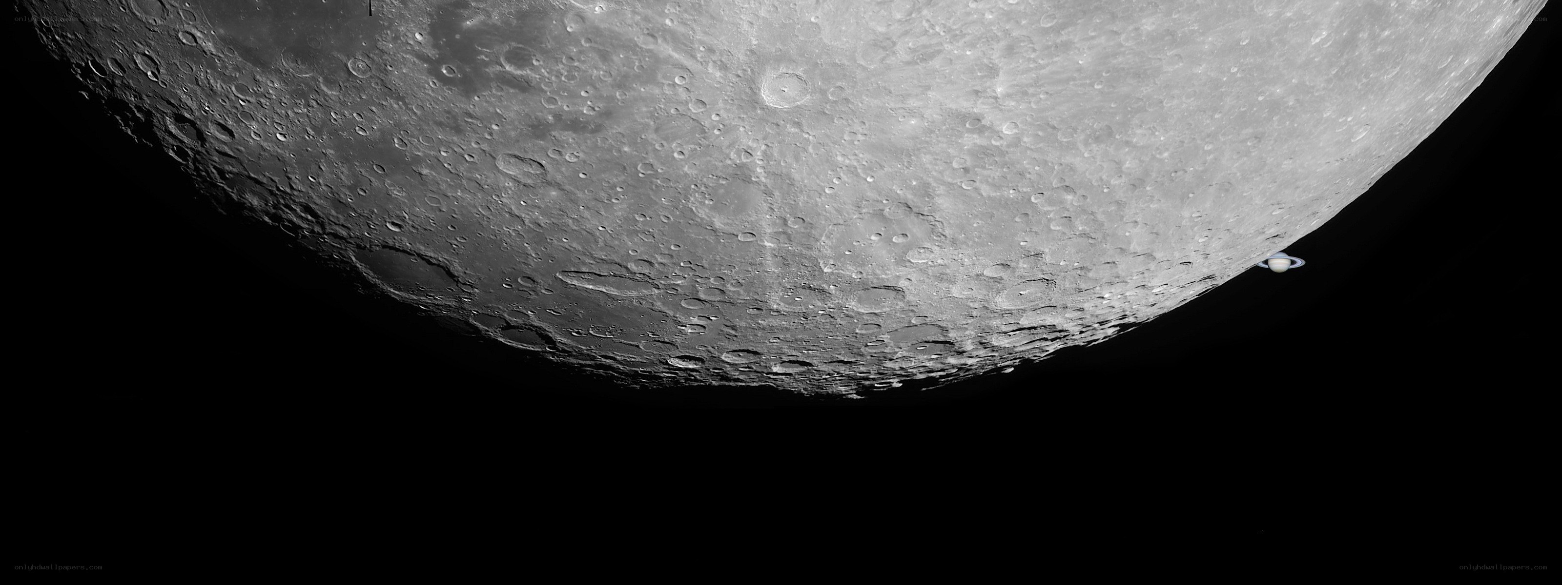 Moon and Saturn in space
