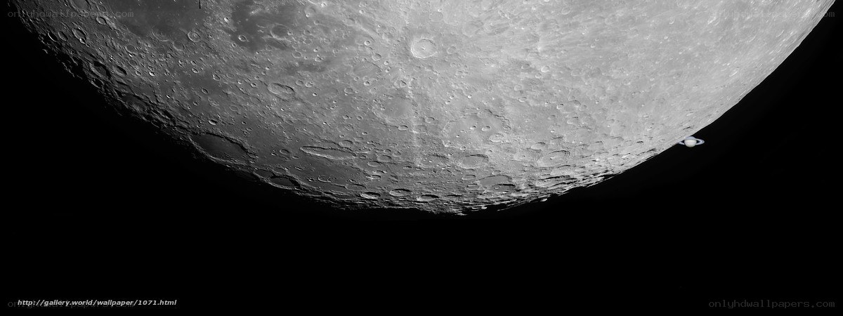 Moon and Saturn in space