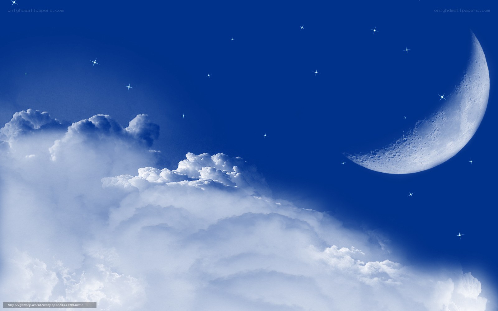 Moon and stars above clouds