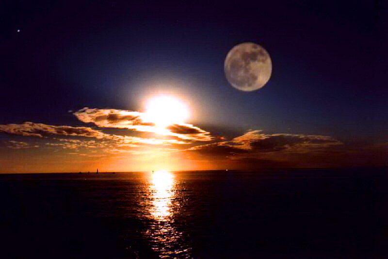 Moon and Sun over Ocean