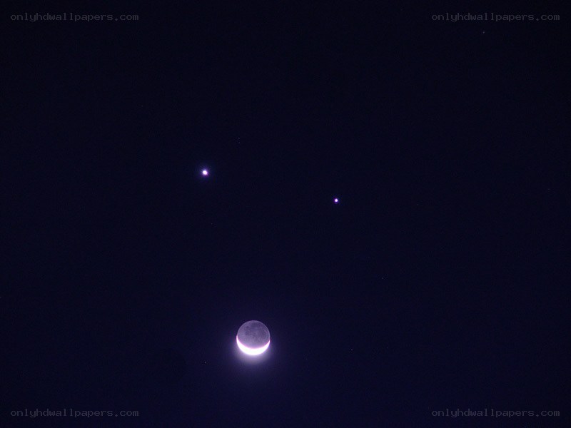 Moon and two planets in night sky