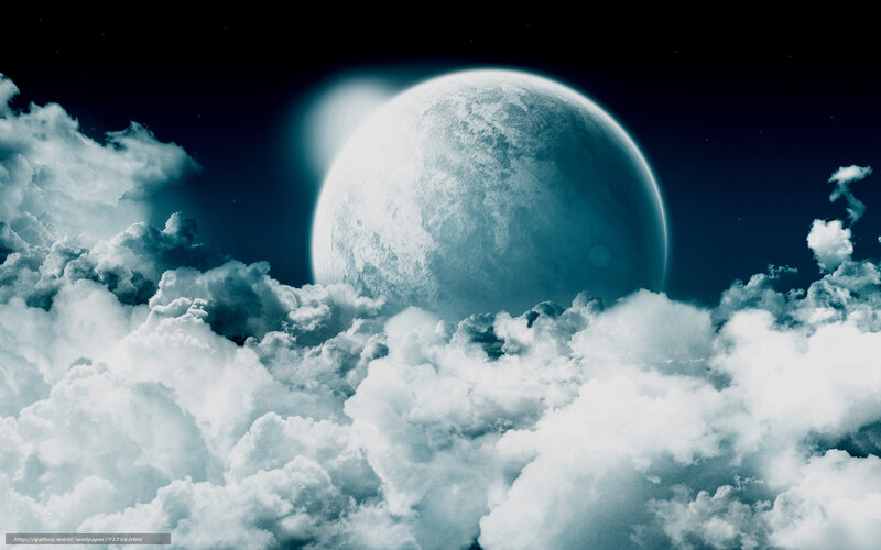 Moon behind clouds at night