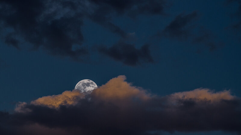 Moon Behind Clouds — Blue, Dramatic