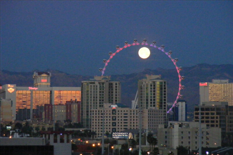 Moon Behind Ferris Wheel