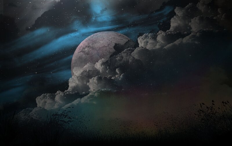Moon behind storm clouds