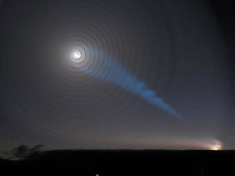 Moon halo and meteor trail