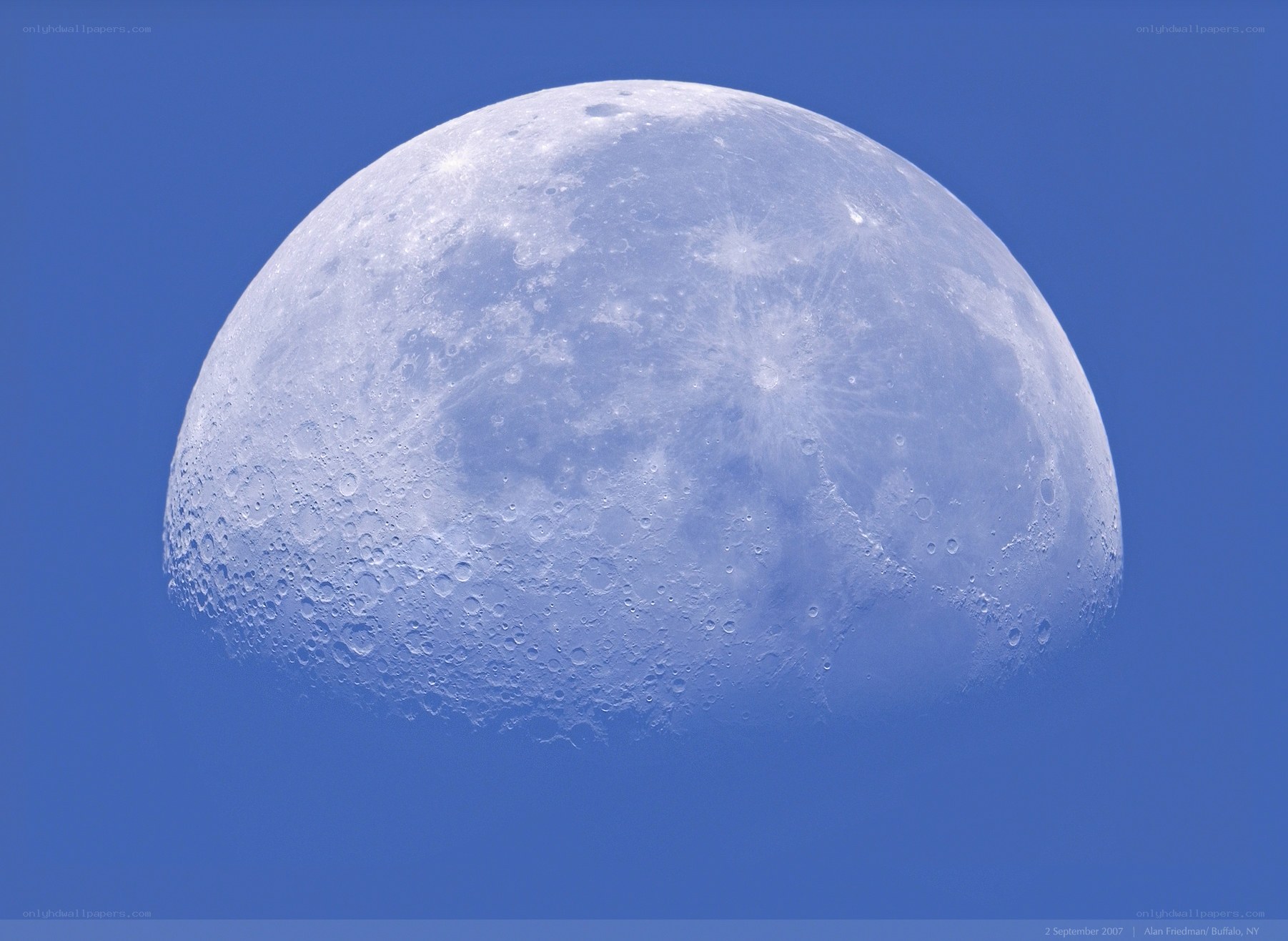 Moon in a blue sky