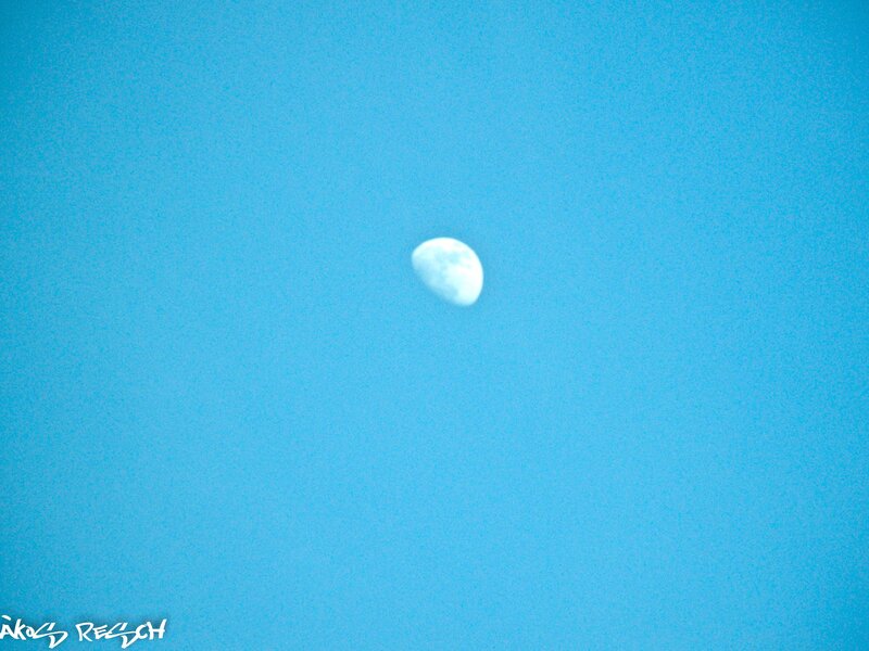 Moon in a blue sky