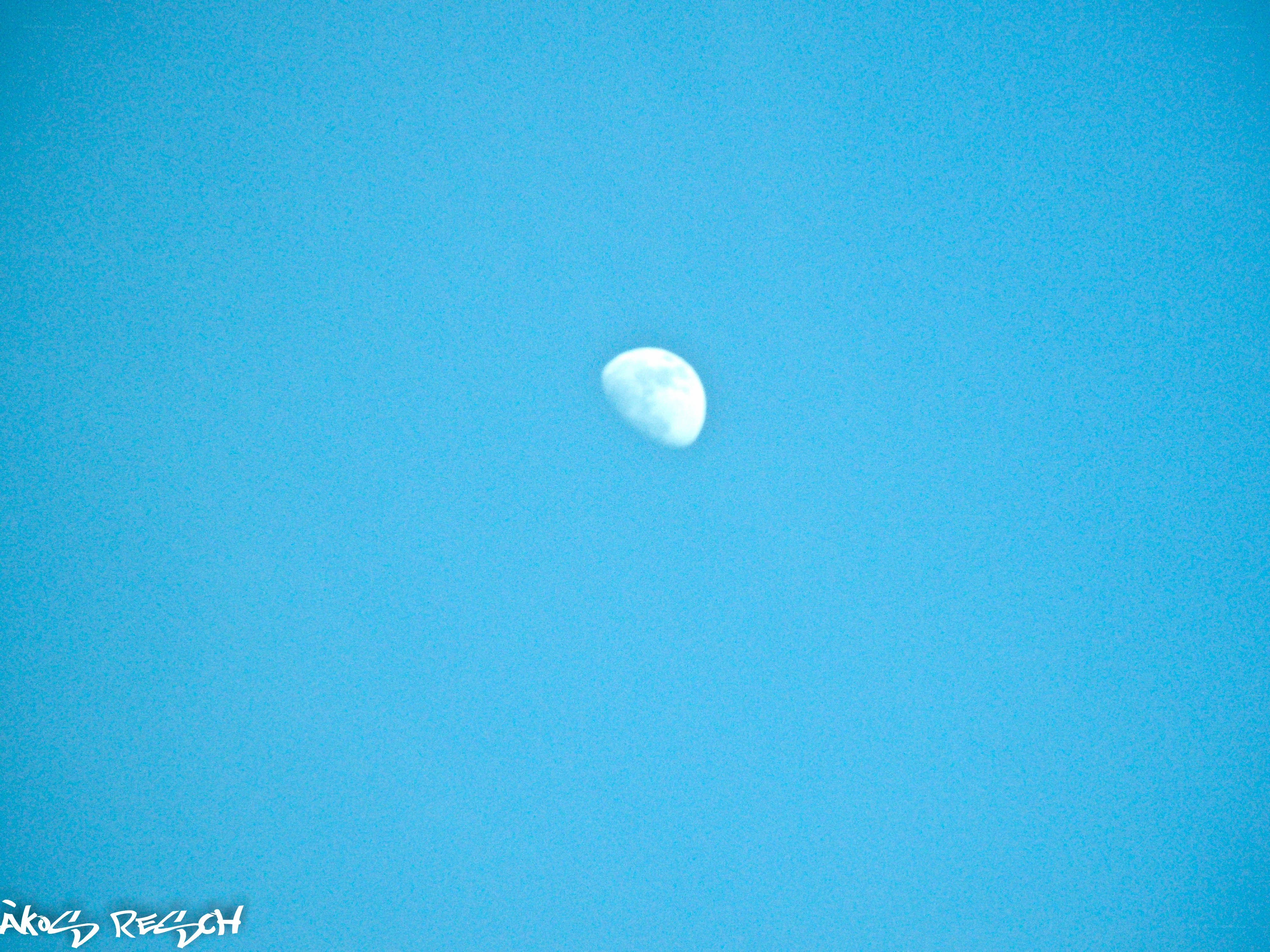 Moon in a blue sky