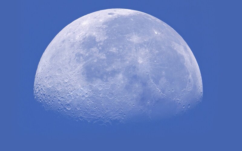 Moon in blue sky