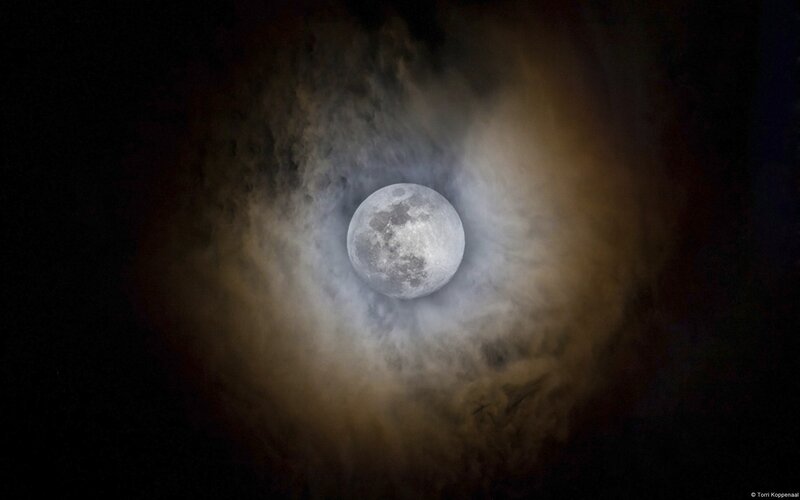 Moon in cloudy sky