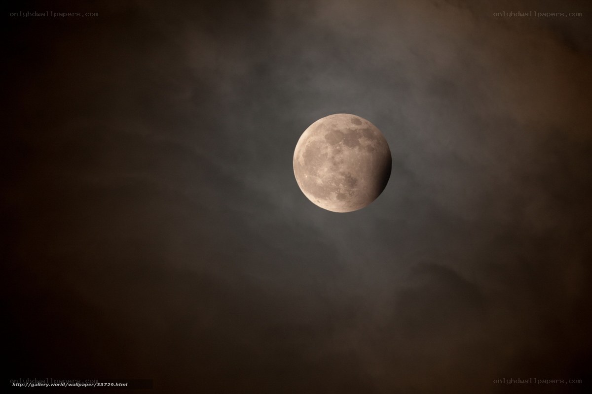 Moon in cloudy sky
