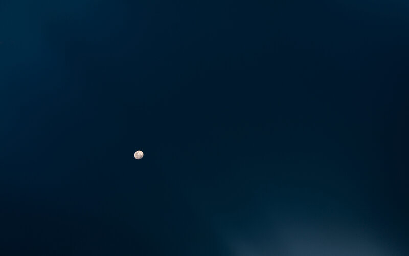 Moon in dark sky
