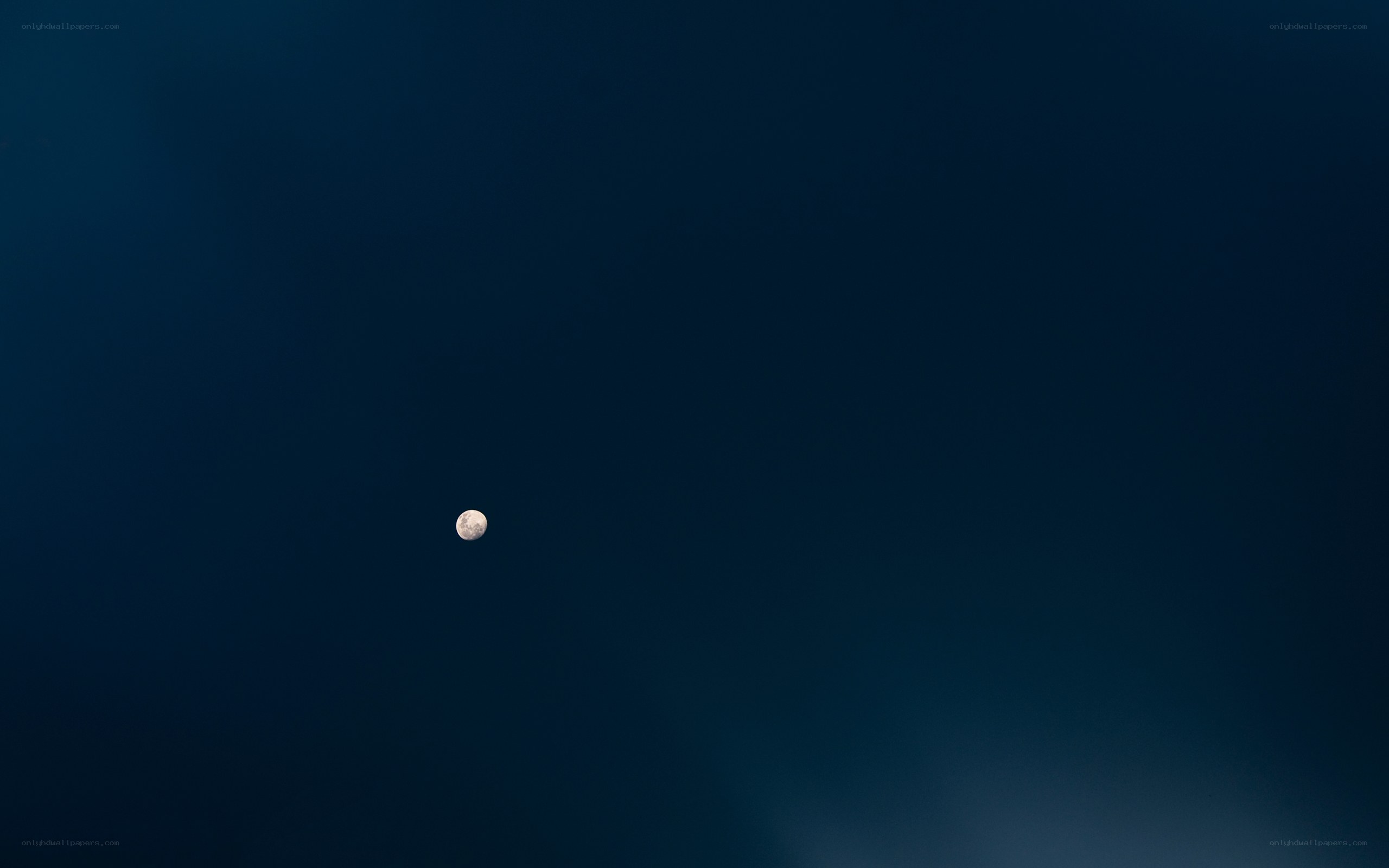 Moon in dark sky