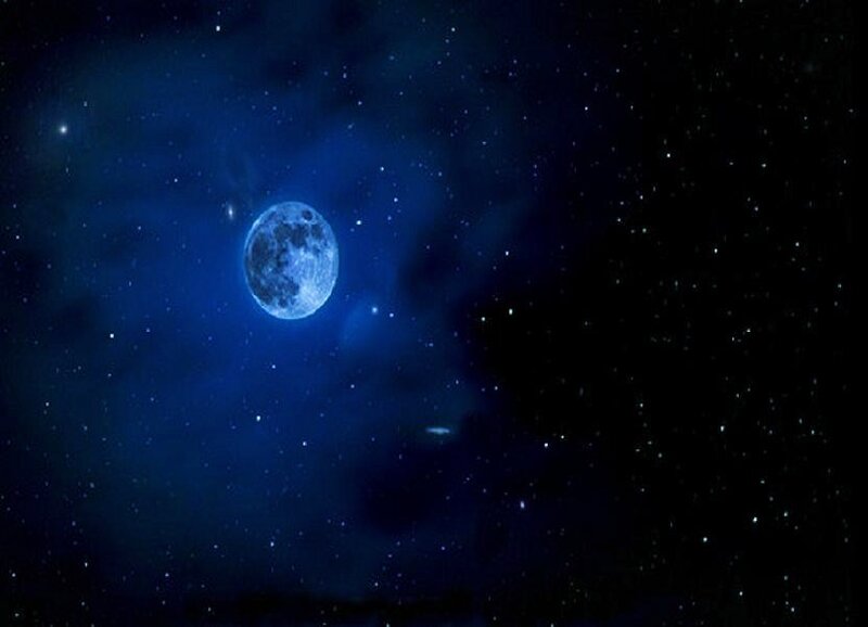 Moon in starry night sky