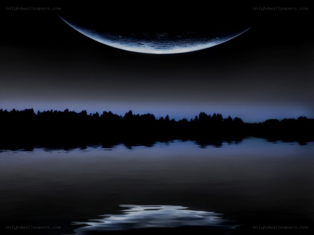 Moon over a calm lake