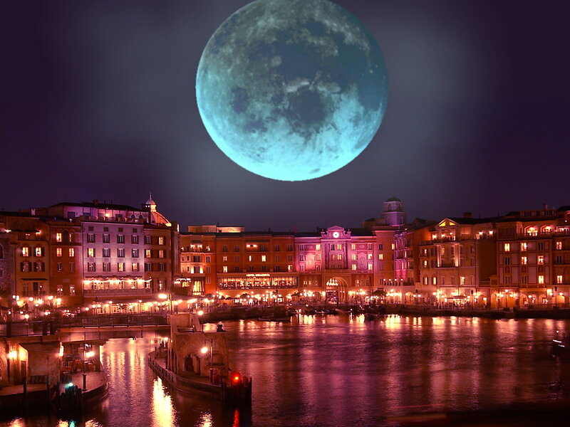 Moon over a canal city