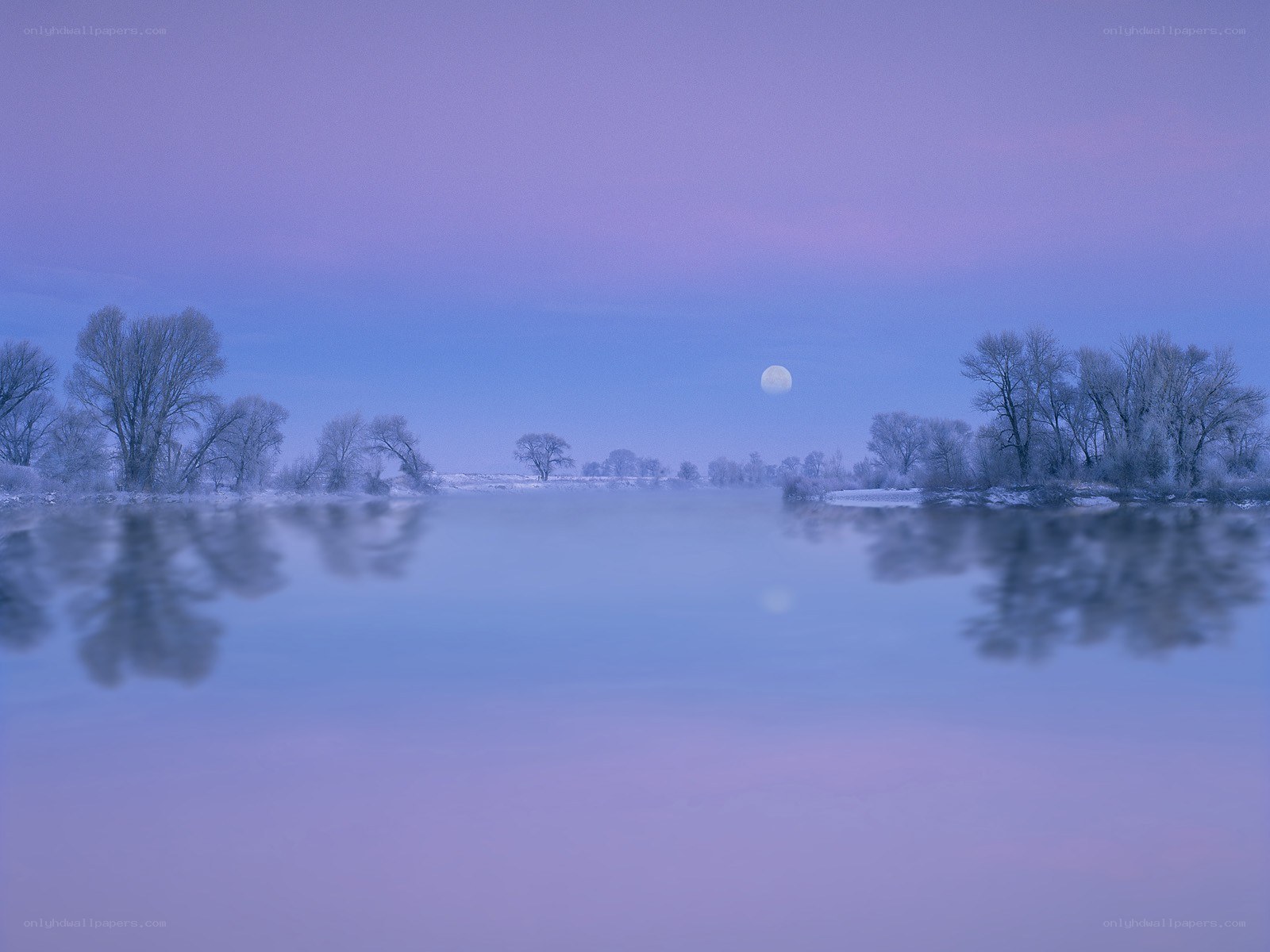 Moon over a frozen river