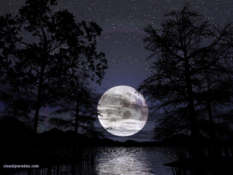 Moon over a lake at night