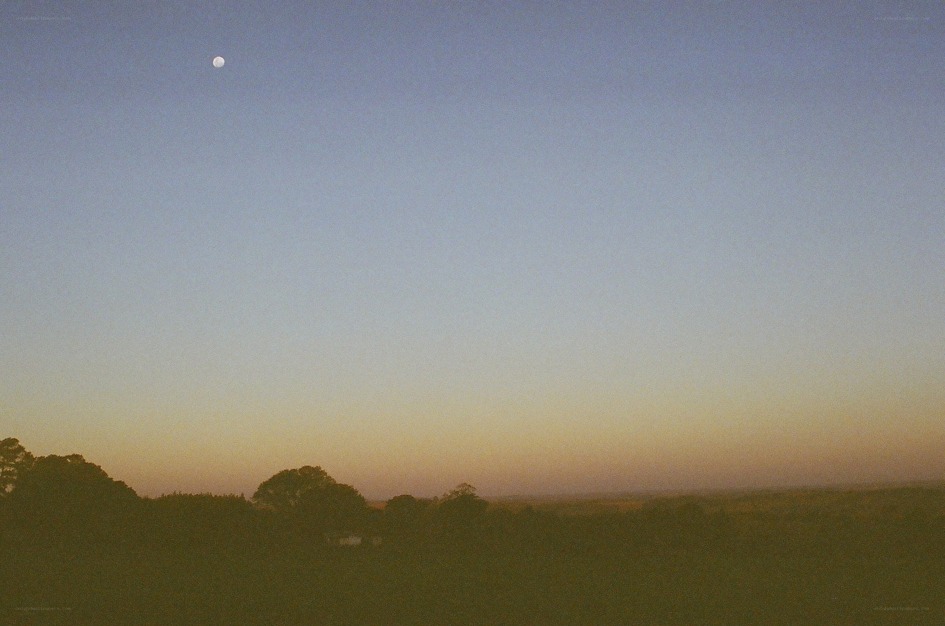 Moon over a quiet landscape