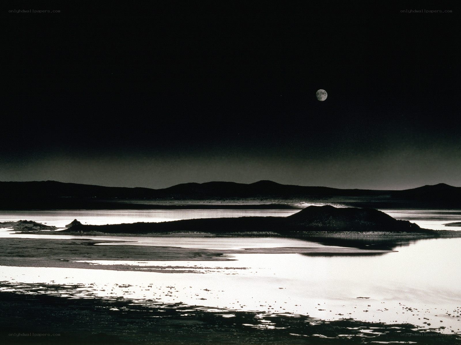 Moon over a tranquil lake