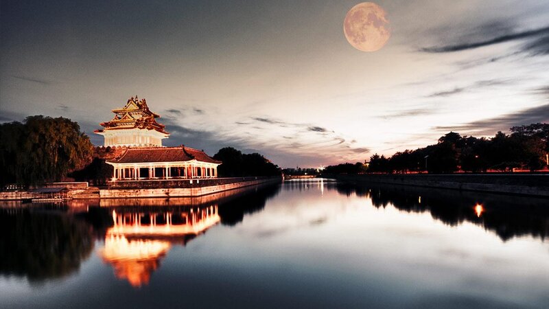 Moon over ancient pavilion