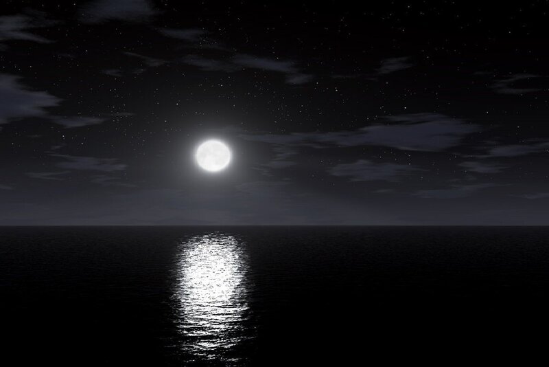 Moon over calm ocean