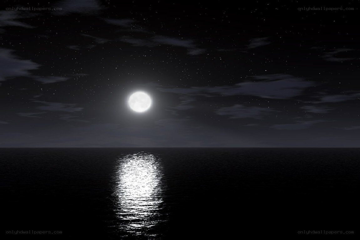 Moon over calm ocean