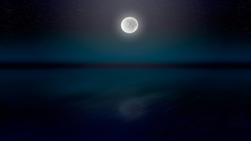 Moon over calm ocean