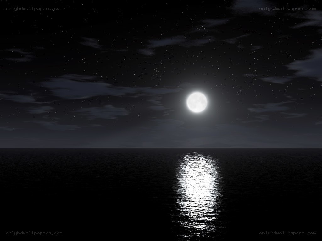 Moon over calm ocean