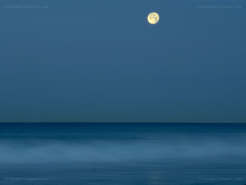 Moon over calm sea