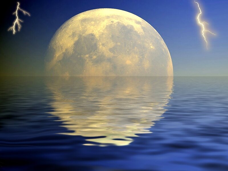 Moon over calm sea with lightning