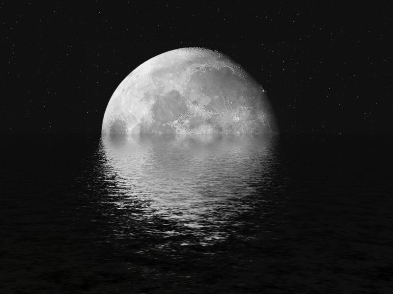 Moon over calm water