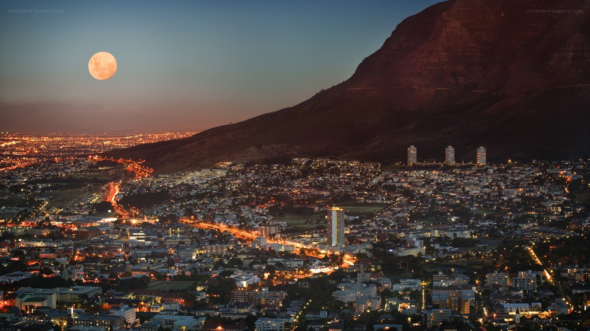 Moon over Cape Town cityscape