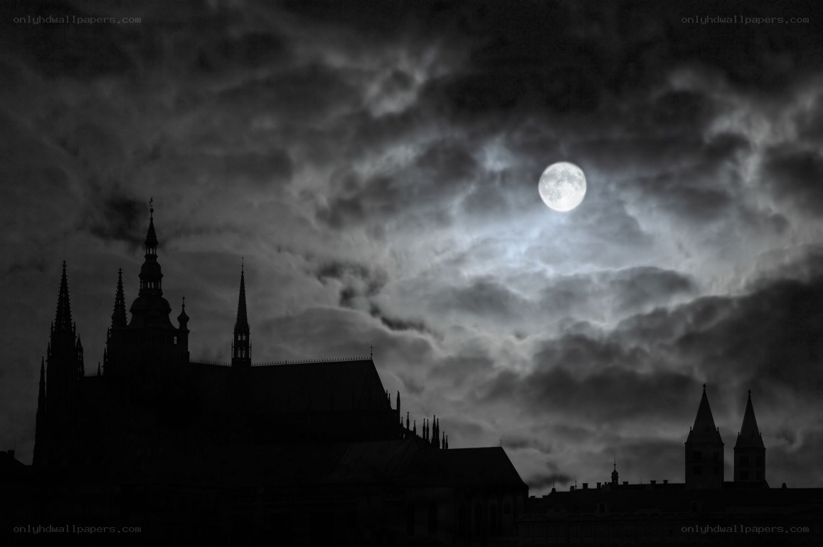 Moon over castle silhouette