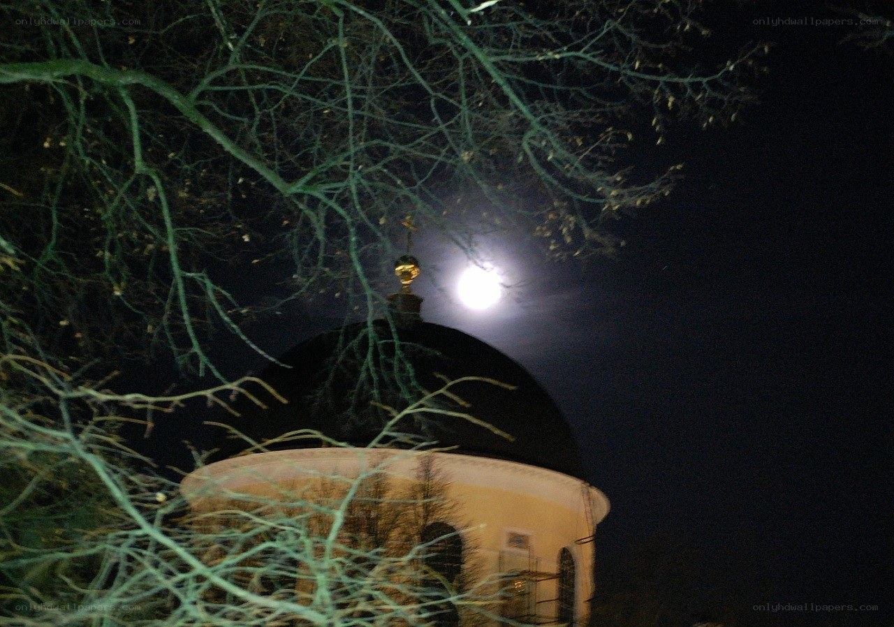 Moon over church dome