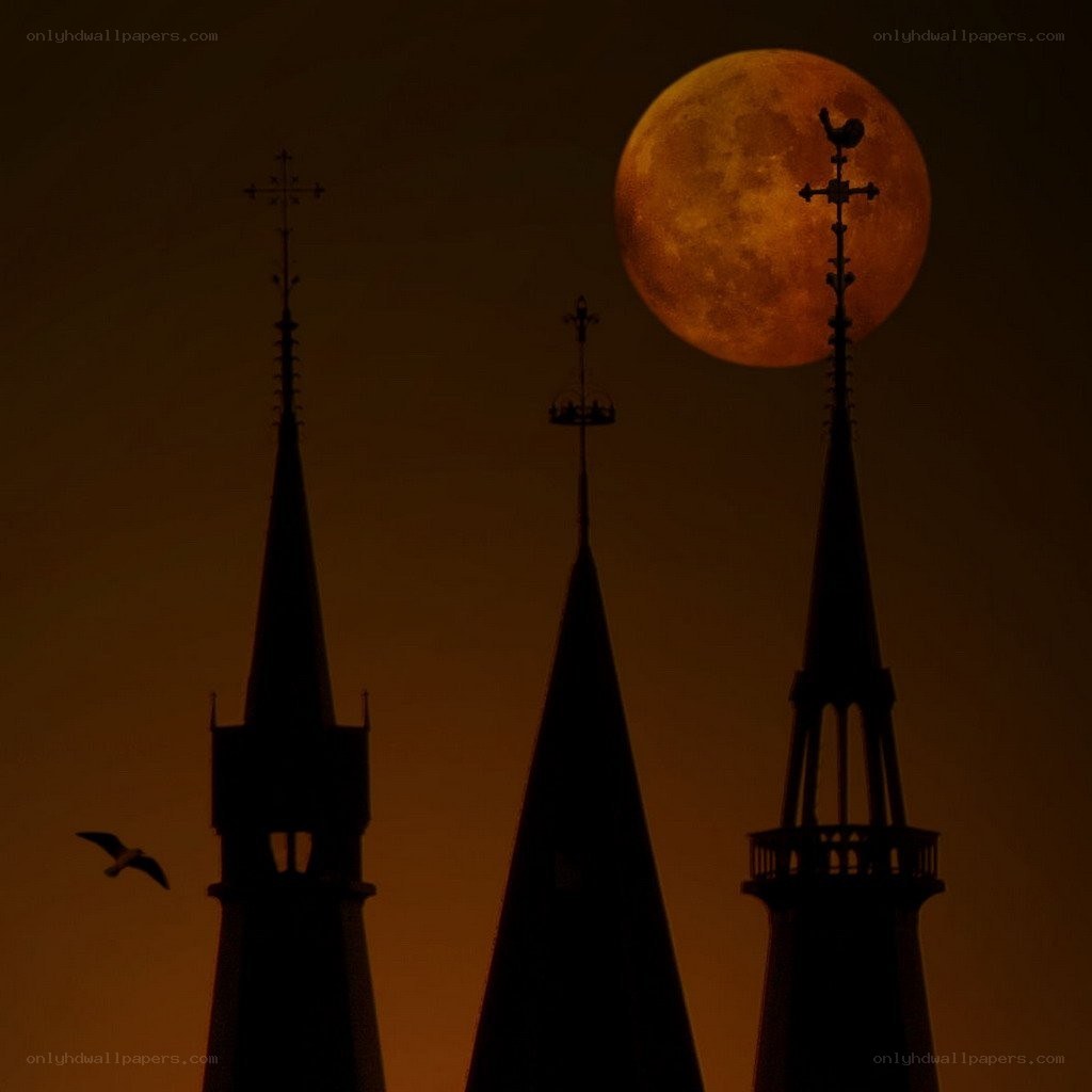 Moon over church spires