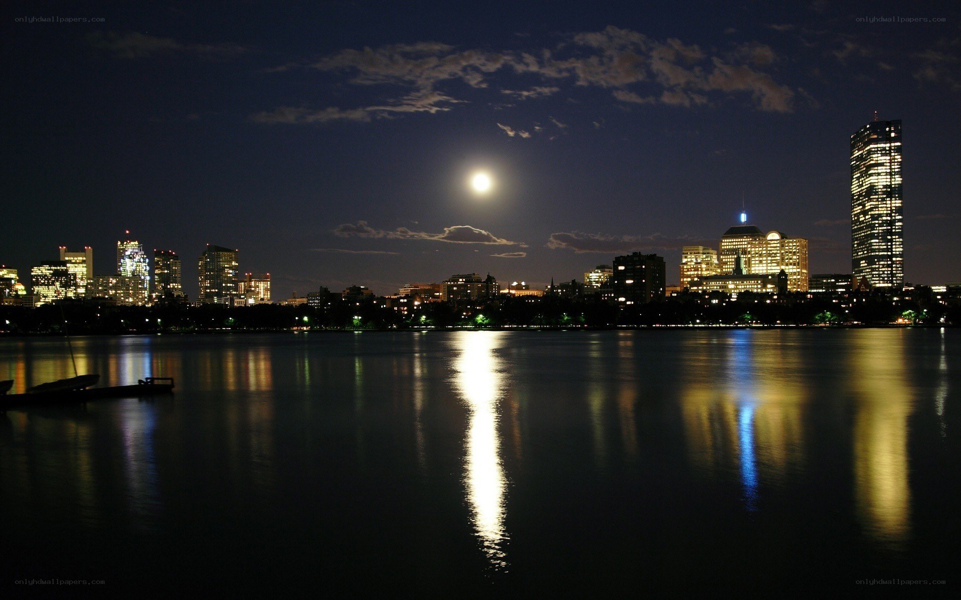 Moon over city skyline