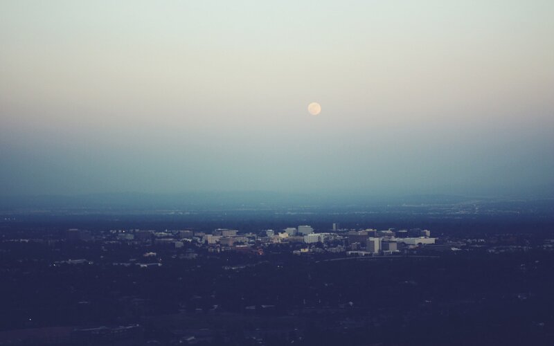 Moon over Cityscape — Blue, Serene, Night