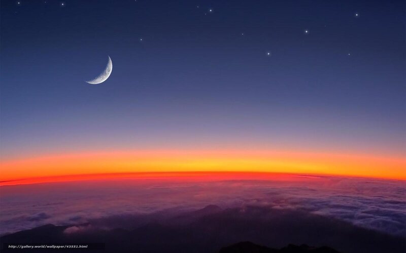 Moon over cloud horizon