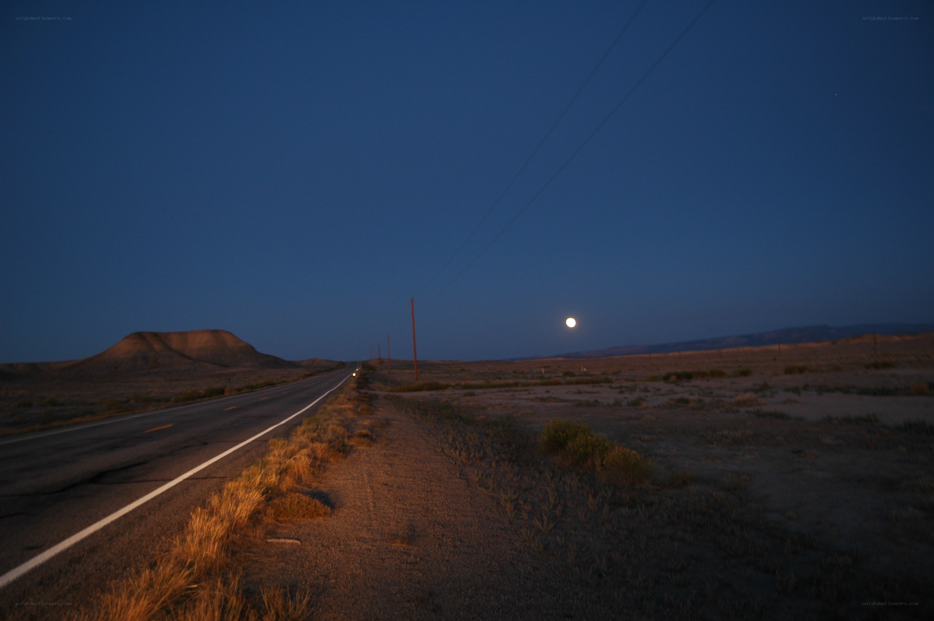 Moon over desert highway