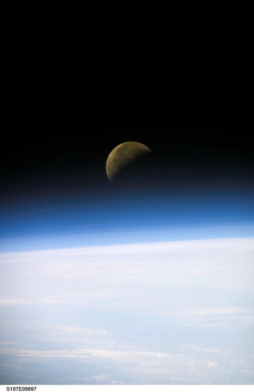 Moon over Earth from space