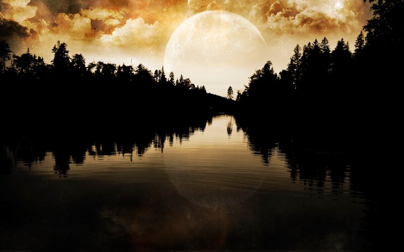 Moon over forest lake