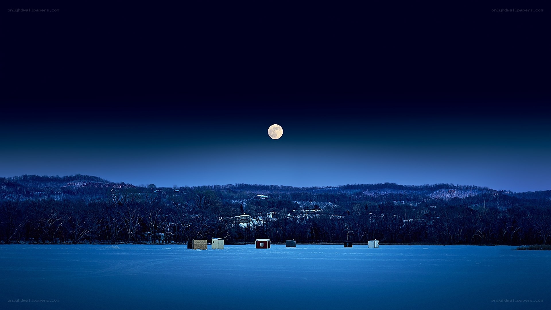 Moon over frozen lake