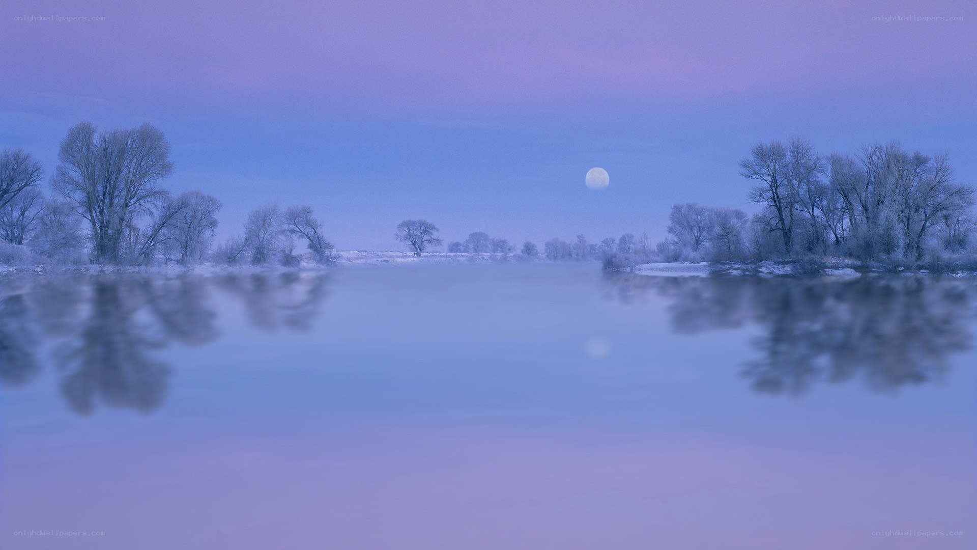 Moon over frozen river