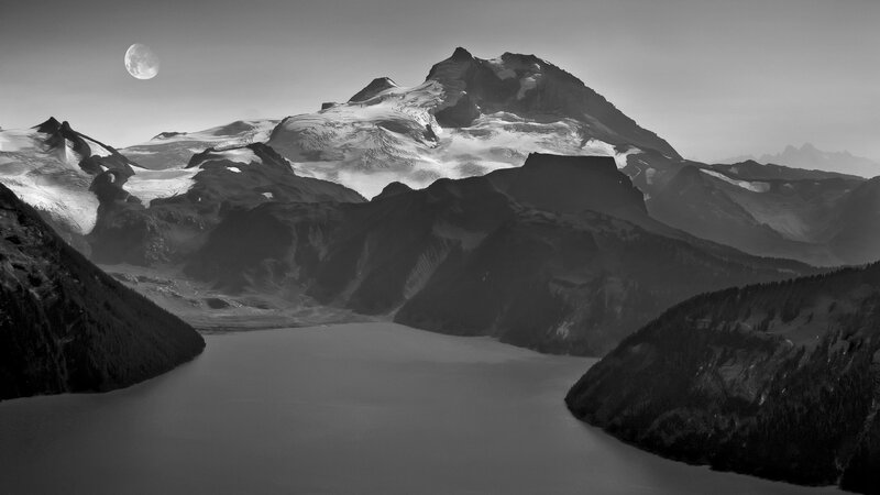 Moon over mountain lake