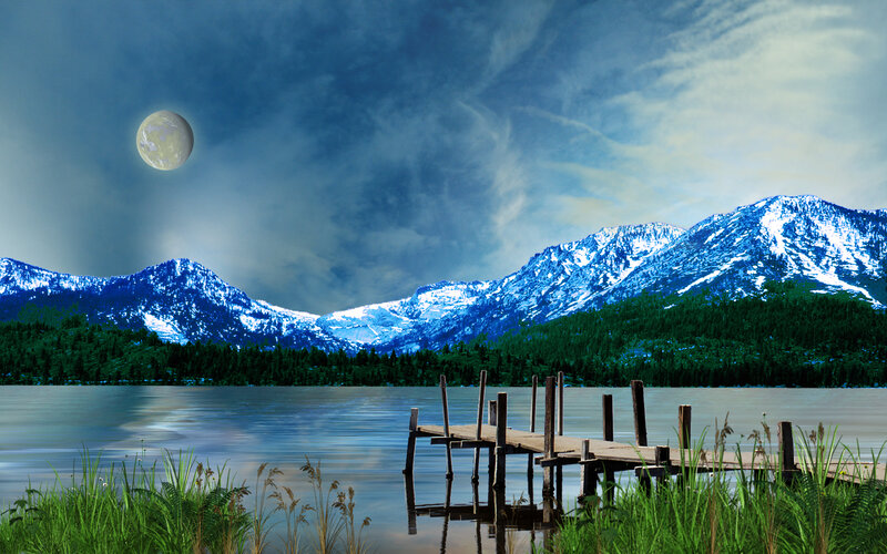 Moon over mountain lake