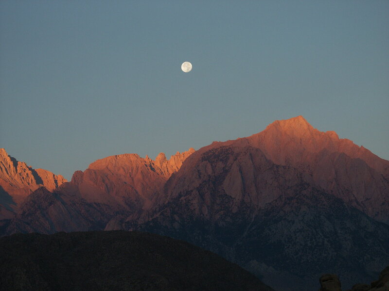 Moon over mountain peaks