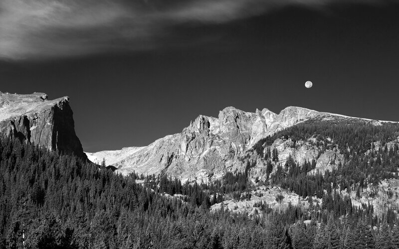 Moon over mountain range