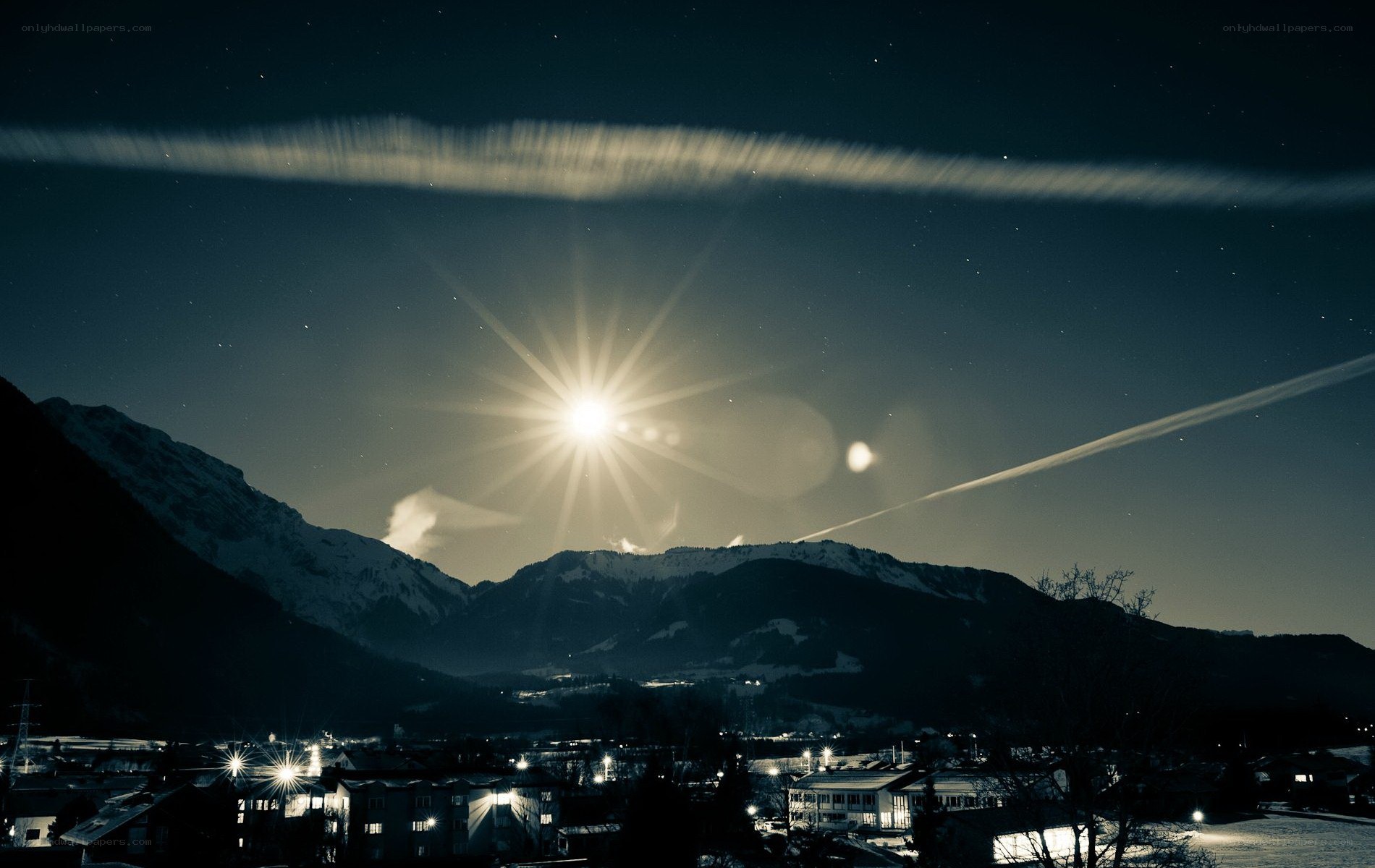 Moon over mountain village